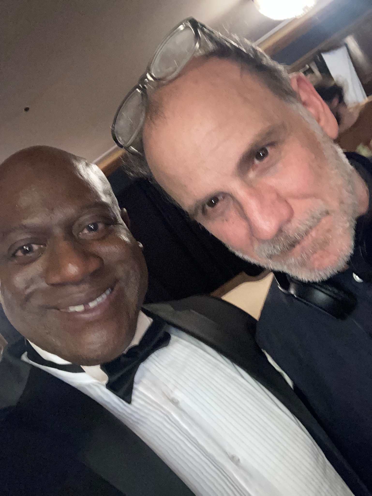 Tomike Ogugua behind the scenes with director Nick Sandow