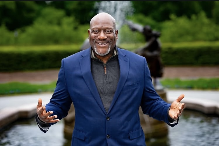 Tomike Ogugua in a blue suit